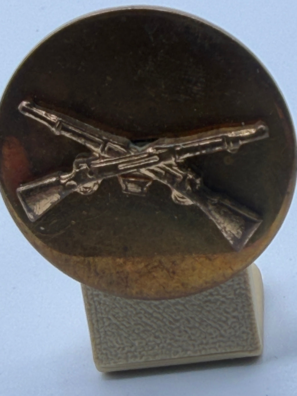 U.S. Army Infantry Collar Disk – Crossed Rifles (WWII–Post‑War Era, Bronze with Light Patina)